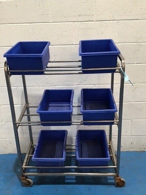 Stainless steel rack with 6 blue plastic tubs